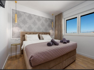 PRIVLAKA, A DUPLEX APARTMENT WITH A SWIMMING POOL IN A NEW BUILDING