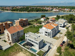 PRIVLAKA, A DUPLEX APARTMENT WITH A SWIMMING POOL IN A NEW BUILDING